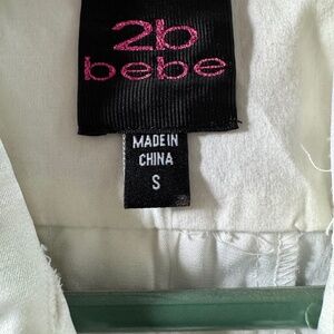 Bebe dress Never worn.  Tag still on.